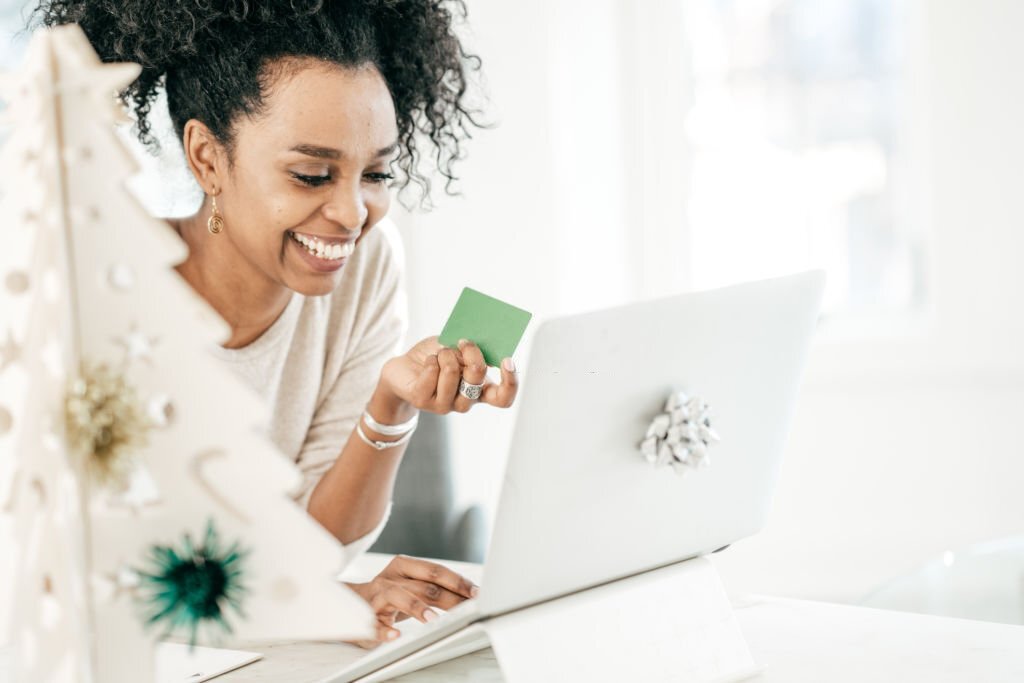 Woman holding a gift card