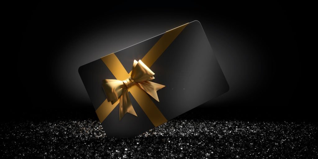 Black Gift Card on dark Crystals with black Background