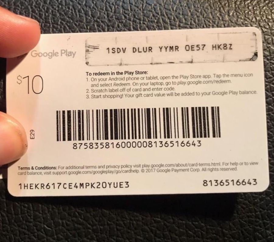 The back of a Google Play card with codes